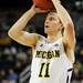 Michigan freshman Nik Stauskas lines up a shot during the second half of an NIT Season Tip-Off game at Crisler Center on Tuesday. Melanie Maxwell I AnnArbor.com